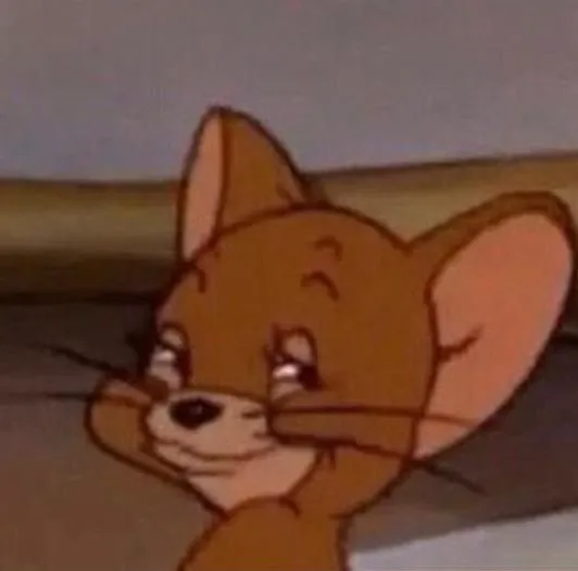 Meme Jerry cười mưu mô, trông cực kỳ cáo già.