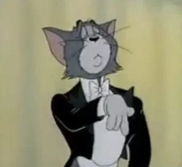 Meme Tom mặc vest đánh piano