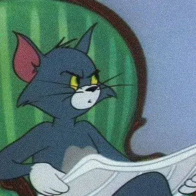 Meme Tom ngồi đọc báo