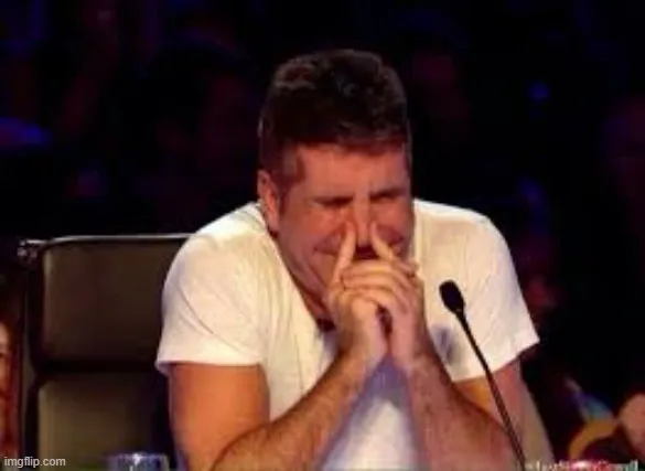 Gương mặt đỏ ửng vì cố nén cười thật chặt