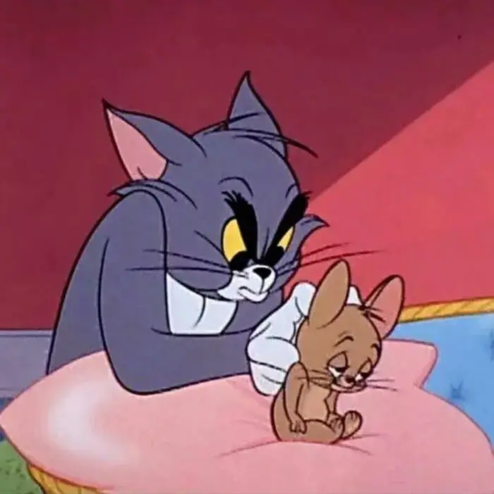 Mèo Tom xoa lưng cho chuột Jerry