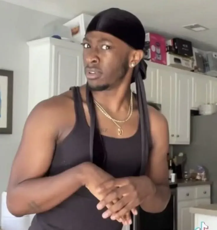 Hình vui người da đen gãi đầu lúng túng ngơ ngác