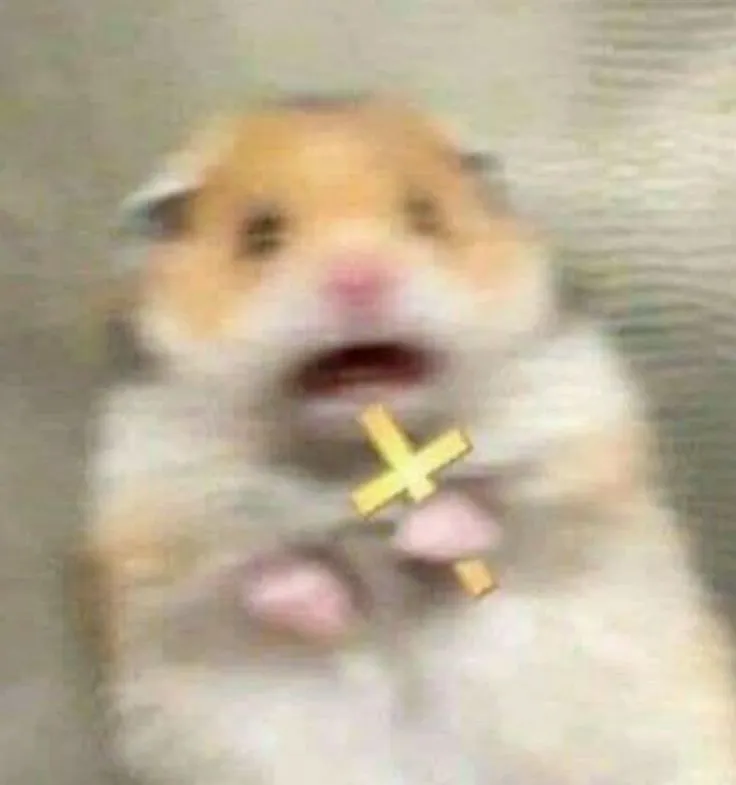 Meme chuột hamster sợ hãi cầm thánh giá