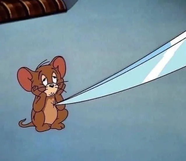 Meme chuột Jerry rơi nước mắt với biểu cảm tội nghiệp.