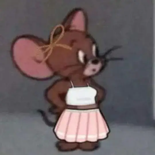 Hình Jerry diện váy đẹp, biểu cảm ngượng ngùng.