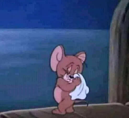 Hình ảnh Jerry khóc thầm, ánh mắt xa xăm buồn bã.