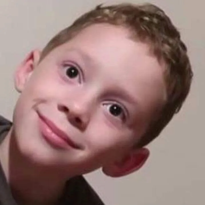 Nụ cười cay đắng pha chút chua chát.