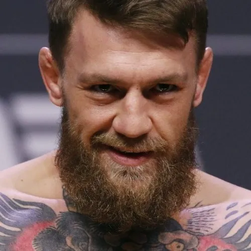 Biểu cảm cười đểu khiến ai khó chịu.