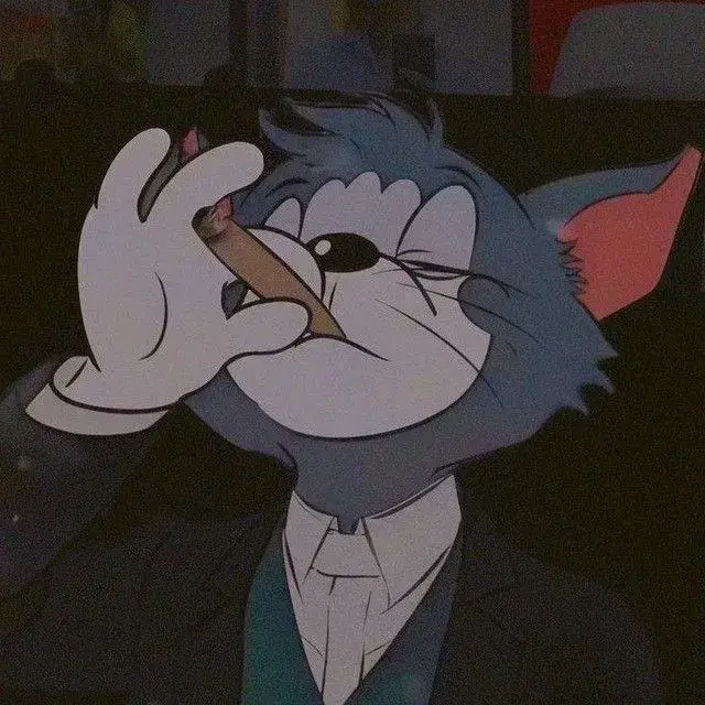 Mèo Tom mặc vest hút thuốc phong độ, thần thái đỉnh cao.