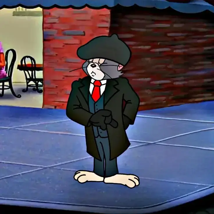 Meme mèo Tom mặc vest trông lịch lãm và sang trọng.