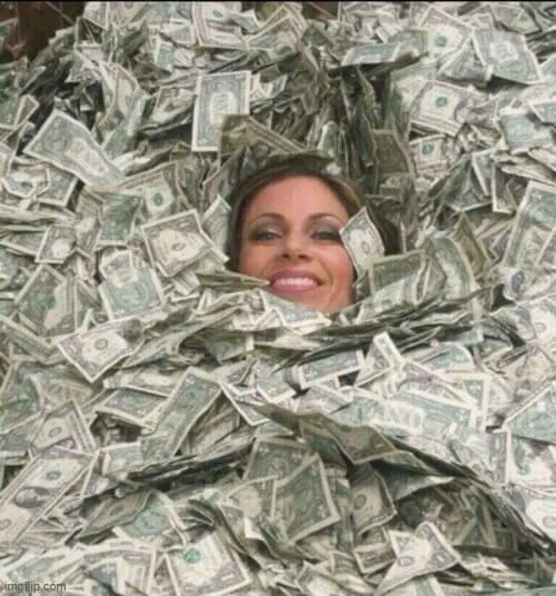 Ngồi giữa núi tiền cảm giác thật vinh quang