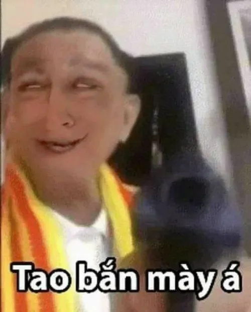 Ảnh chế meme cầm súng lục chỉa vào màn hình cực gắt