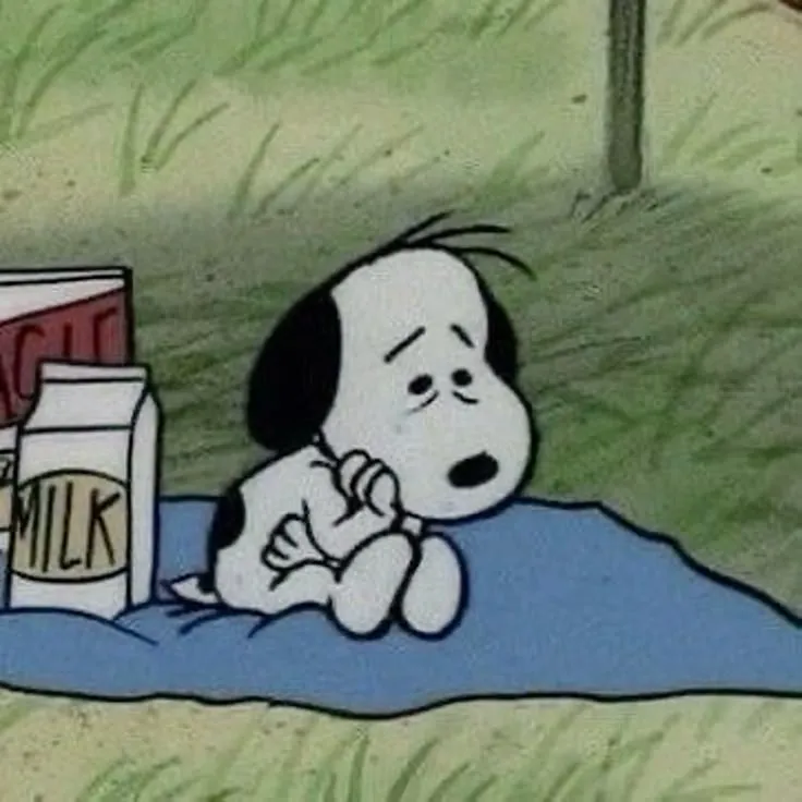 Meme chó buồn tủi, đôi tai cụp xuống.