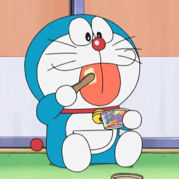 Meme Doraemon cười ngây ngô vô tội
