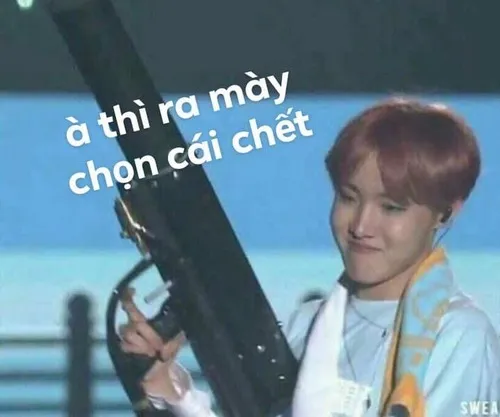 Ảnh hài súng Uzi và gương mặt troll cười nửa miệng