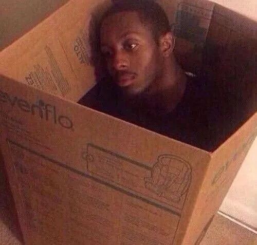 Hình troll ngồi một góc co chân cạnh bức tường im lặng