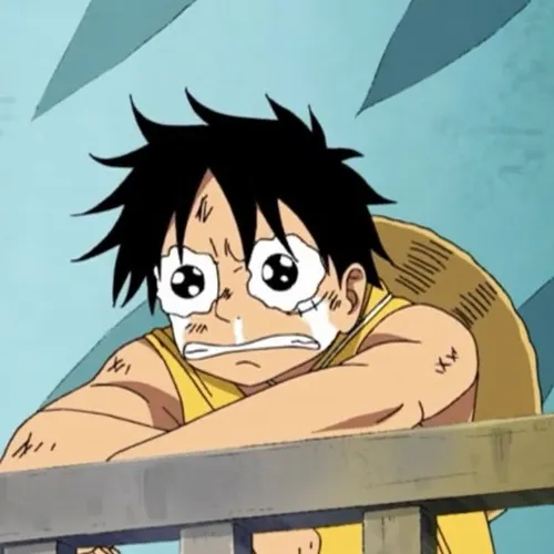 Meme Luffy dang tay tự do trong cảnh hoàng hôn đỏ rực trên mặt biển