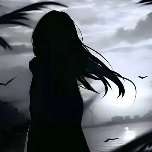 Ảnh hiển thị ảnh lặng lẽ dưới ánh sáng yếu phủ vai