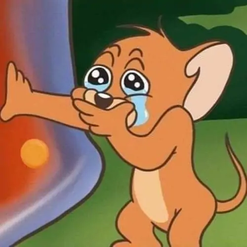 23 Jerry ló ra từ mép tường, mắt mở lớn và miệng hé nhẹ như mới chứng kiến chuyện ngoài sức tưởng tượng, đúng kiểu meme từ chối hiểu rất bén