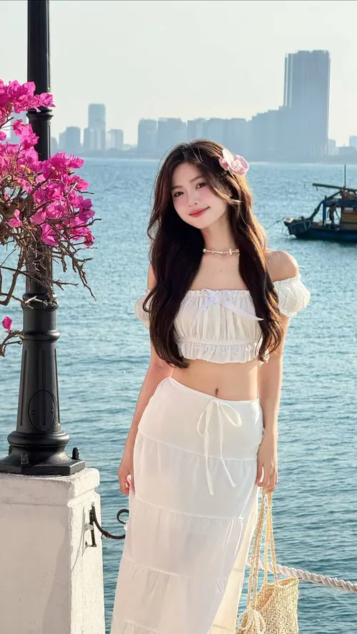 6 Bên lan can ven biển cô nàng áo trắng chân váy dài tạo dáng trong hình nền gái xinh 4k